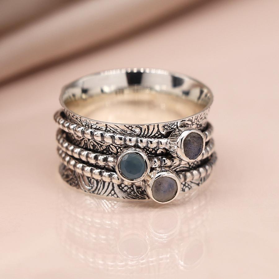 Sterling silver floral spinning ring with triple gemstone